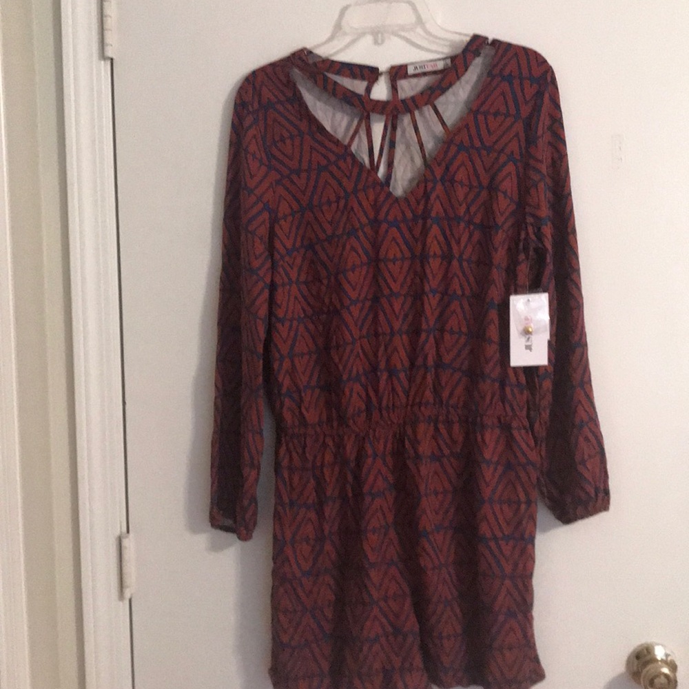 Long sleeve romper with open back new with tags